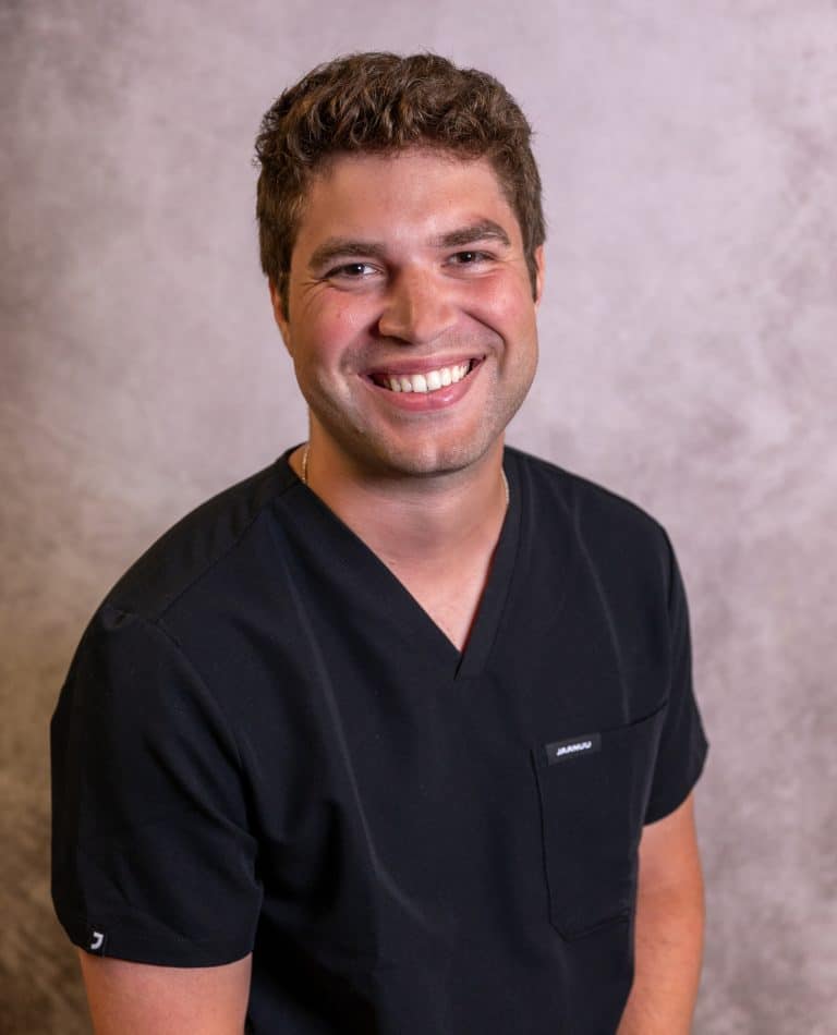 Dr Adam Romund